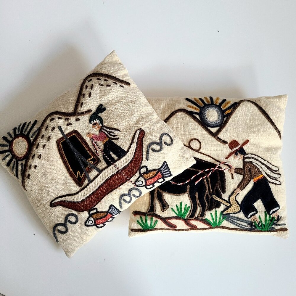 2 Peruvian pillows/cushions with traditional working people embroidery design.